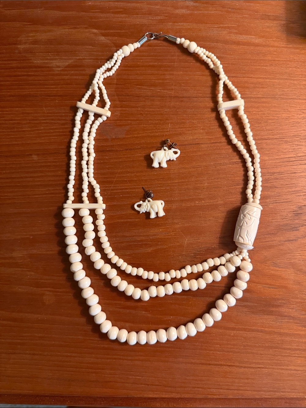 Handcrafted Cream Beaded Multi-Strand Necklace with Elephant Stud Earrings